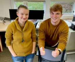 Maddie (Left), and Reese (Right) posing for a picture in same yellow outfits.